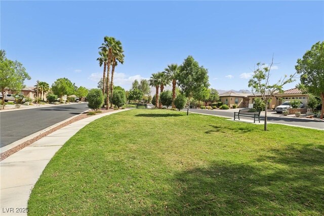 8316 Imperial Lakes St, Las Vegas, NV 89131 - view of community featuring a lawn and a residential view