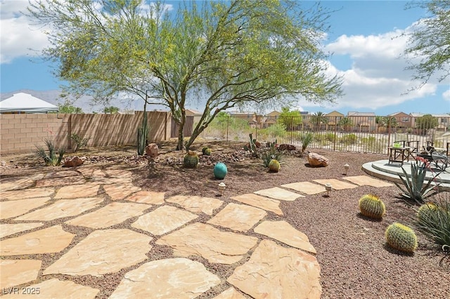 8316 Imperial Lakes St, Las Vegas, NV 89131 - fenced backyard with a patio