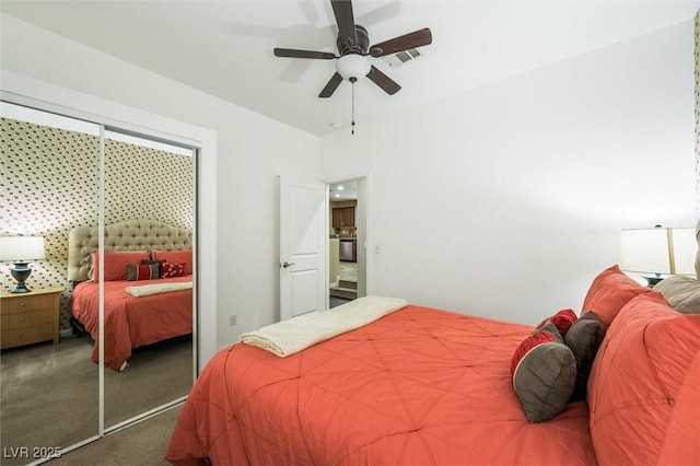 bedroom with a ceiling fan, visible vents, and carpet