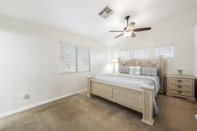bedroom featuring visible vents, carpet floors, baseboards, a ceiling fan, and vaulted ceiling