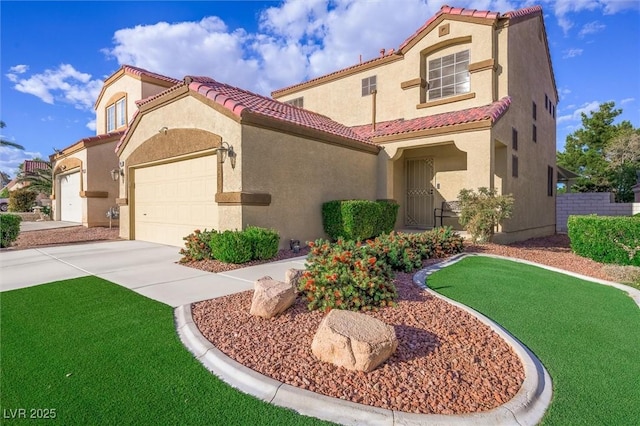 mediterranean / spanish house with a garage, a front lawn, stucco siding, a tiled roof, and driveway