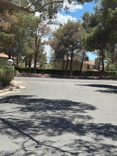 2713 Otter Creek Ct Unit 202, Las Vegas, NV 89117 - view of asphalt road featuring curbs