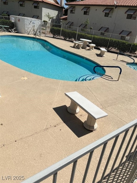 2713 Otter Creek Ct Unit 202, Las Vegas, NV 89117 - community pool featuring a patio