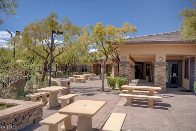 view of home's community featuring a patio