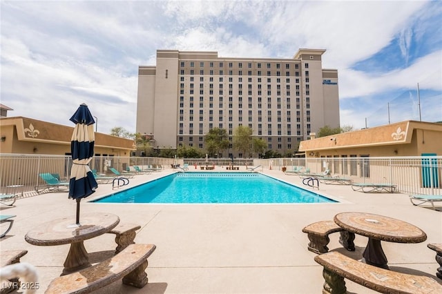 205 E Harmon Ave Unit 409, Las Vegas, NV 89169 - community pool with a patio and fence