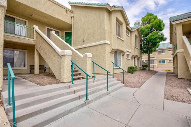 surrounding community featuring stairway