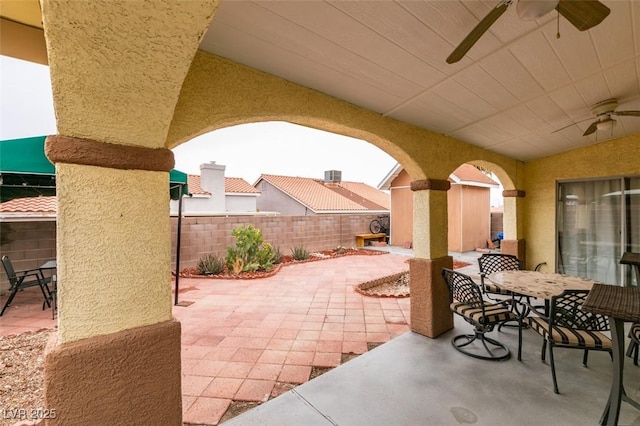 2595 Fort Lauderdale Dr, Las Vegas, NV 89156 - view of patio / terrace featuring outdoor dining area, a ceiling fan, and a fenced backyard