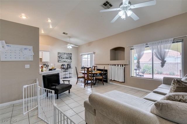 2595 Fort Lauderdale Dr, Las Vegas, NV 89156 - living area with ceiling fan, lofted ceiling, light tile patterned floors, and baseboards
