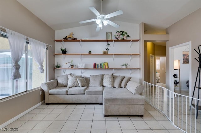 2595 Fort Lauderdale Dr, Las Vegas, NV 89156 - living area with ceiling fan, lofted ceiling, light tile patterned flooring, and baseboards