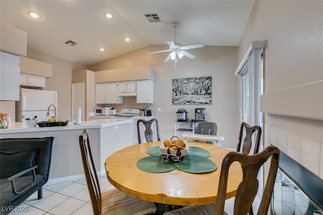 2595 Fort Lauderdale Dr, Las Vegas, NV 89156 - dining space with a ceiling fan, lofted ceiling, light tile patterned floors, and recessed lighting