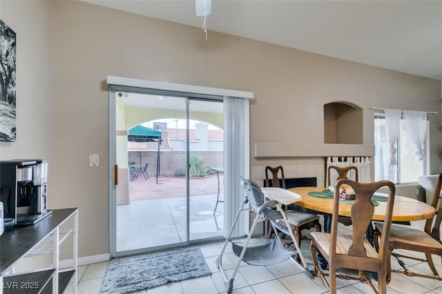 2595 Fort Lauderdale Dr, Las Vegas, NV 89156 - dining room with plenty of natural light, light tile patterned floors, and baseboards