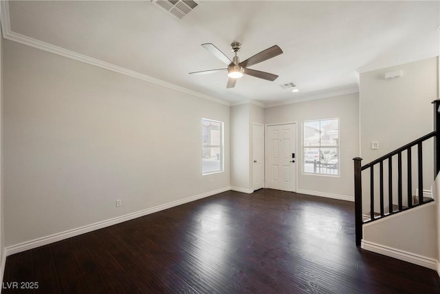 entrance foyer featuring visible vents, baseboards, and dark wood-style floors