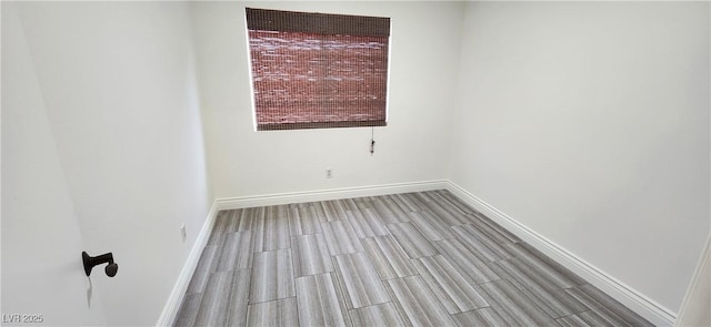 4308 Apex Dr, Las Vegas, NV 89147 - empty room featuring baseboards and wood finished floors