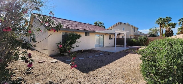 4308 Apex Dr, Las Vegas, NV 89147 - rear view of house featuring fence, a pergola, stucco siding, a patio area, and a tiled roof