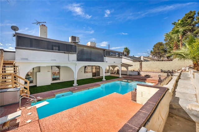 view of pool featuring stairs, a fenced in pool, a fenced backyard, central AC unit, and a patio area