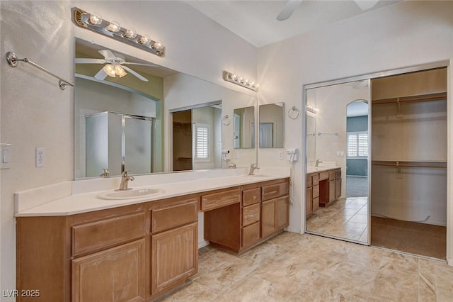full bathroom featuring a sink, plenty of natural light, and a ceiling fan