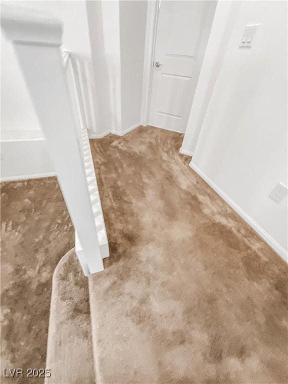 interior details with carpet floors and baseboards