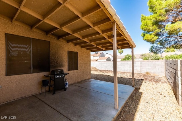 2805 Rungsted St, Las Vegas, NV 89142 - view of patio / terrace featuring a fenced backyard and a grill