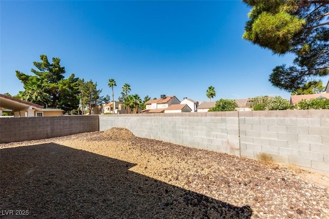 2805 Rungsted St, Las Vegas, NV 89142 - view of yard with a fenced backyard and a residential view