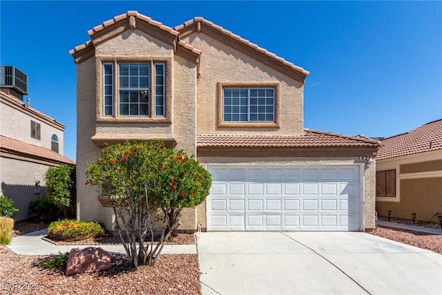 6428 Yarmouth Dr, Las Vegas, NV 89108 - traditional-style home with a tile roof, a garage, stucco siding, central AC unit, and concrete driveway