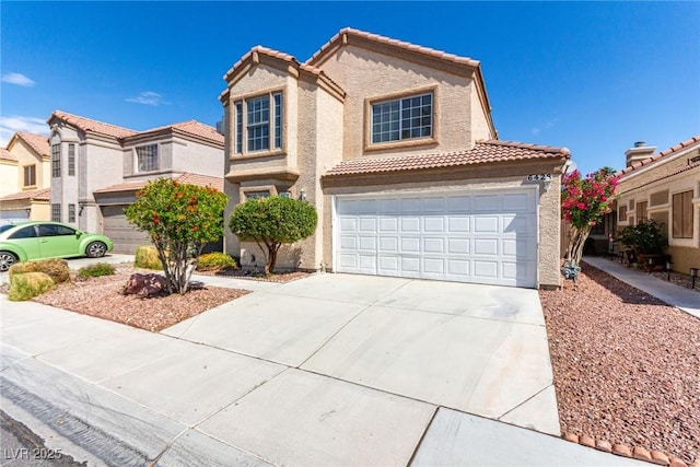 6428 Yarmouth Dr, Las Vegas, NV 89108 - view of front facade featuring stucco siding, a tile roof, an attached garage, driveway, and a residential view