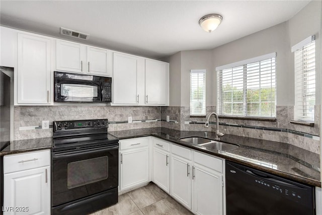6428 Yarmouth Dr, Las Vegas, NV 89108 - kitchen featuring white cabinets, visible vents, a sink, and black appliances