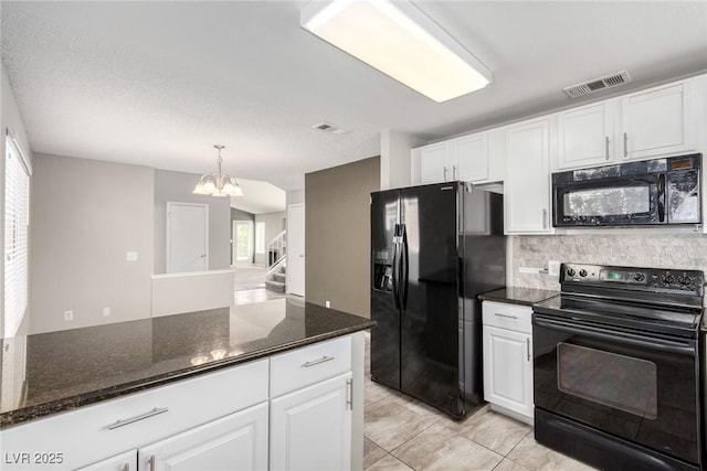 6428 Yarmouth Dr, Las Vegas, NV 89108 - kitchen featuring plenty of natural light, visible vents, white cabinets, black appliances, and a notable chandelier