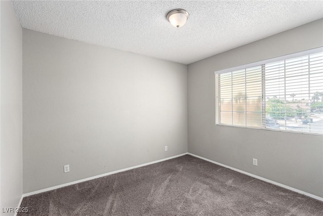 6428 Yarmouth Dr, Las Vegas, NV 89108 - carpeted empty room featuring baseboards and a textured ceiling