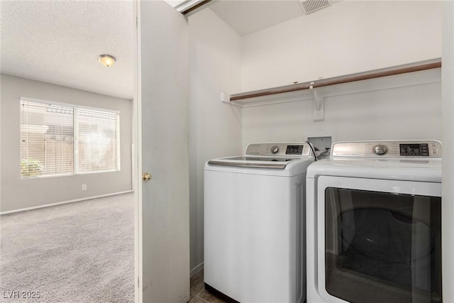 6428 Yarmouth Dr, Las Vegas, NV 89108 - laundry room featuring carpet flooring, laundry area, baseboards, visible vents, and washing machine and dryer