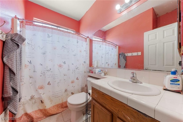 full bath with vanity, tile patterned floors, toilet, and curtained shower
