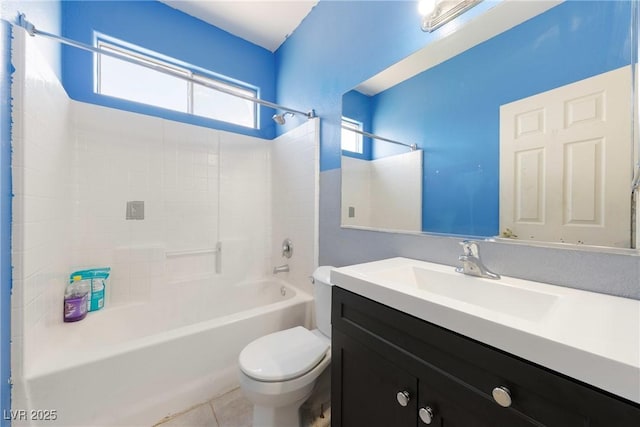 bathroom featuring vanity, tile patterned flooring, toilet, and tub / shower combination