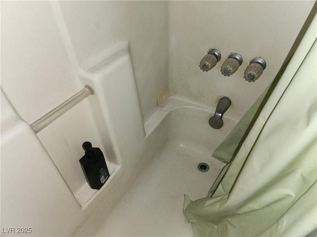 interior details with a shower