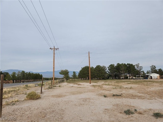 exterior space featuring a rural view and a mountain view