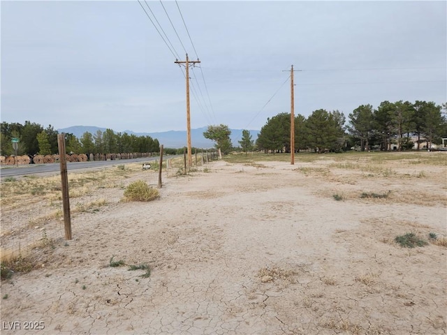 exterior space featuring a rural view and a mountain view