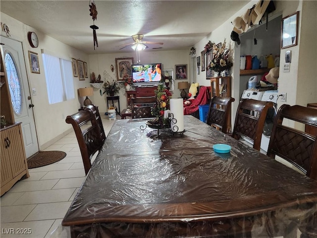 dining room with ceiling fan and light tile patterned floors