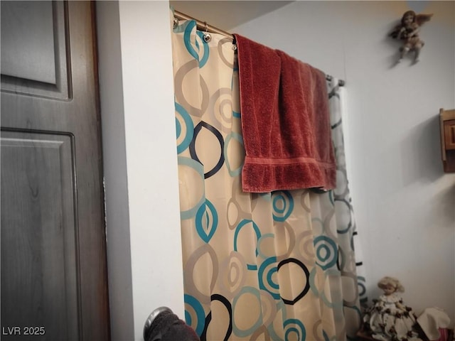 full bath with a shower with curtain