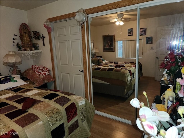 bedroom featuring ceiling fan and wood finished floors