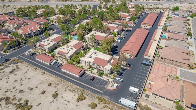 birds eye view of property with a residential view