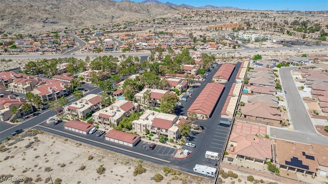 drone / aerial view with a residential view and a mountain view