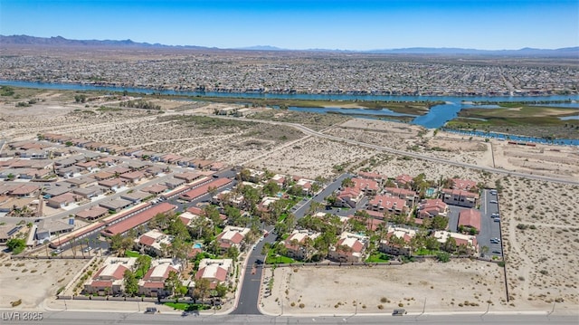 aerial view with a residential view and a water and mountain view