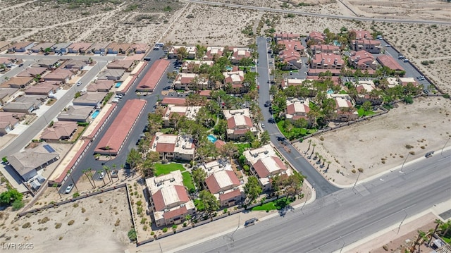 aerial view featuring a residential view and view of desert