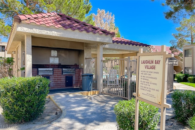 exterior space with fence and area for grilling