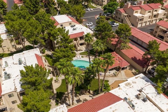 birds eye view of property with a residential view