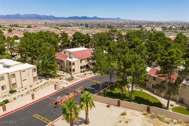 bird's eye view featuring a residential view and a mountain view