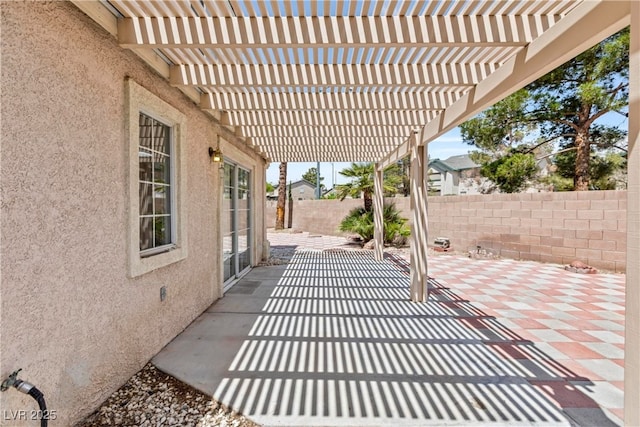 view of patio featuring a pergola and a fenced backyard