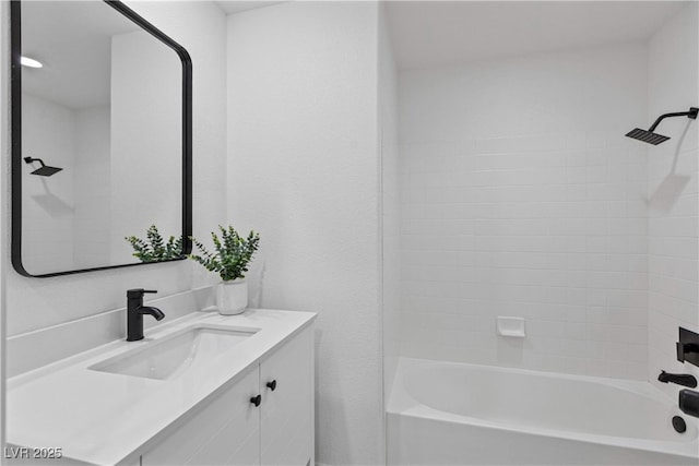 bathroom featuring vanity and bathtub / shower combination