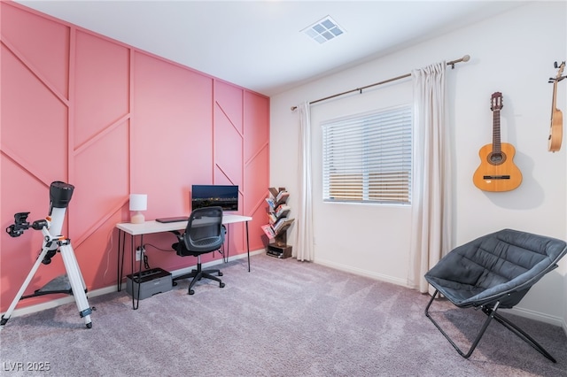 home office featuring light carpet and baseboards