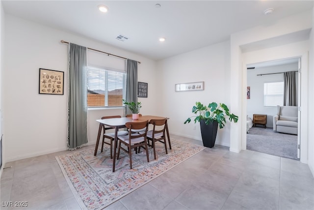 dining room featuring recessed lighting and baseboards