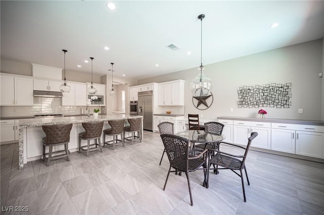 12018 Vento Forte Ave, Las Vegas, NV 89138 - dining space featuring recessed lighting