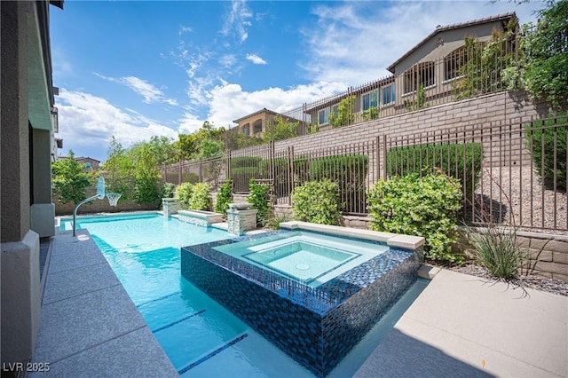 12018 Vento Forte Ave, Las Vegas, NV 89138 - view of pool featuring fence and a pool with connected hot tub